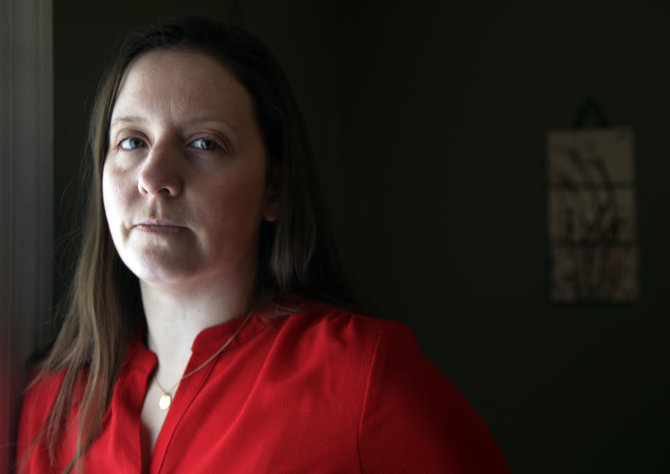 In this Feb. 26, 2019, photo, Stephanie Clark, executive director at Amirah, poses for a photo, in Wakefield, Mass. Amirah is an organization that works to provide safe spaces for victims and survivors of sex trafficking in New England, where illegal massage parlors have proliferated. (AP Photo/Elise Amendola)