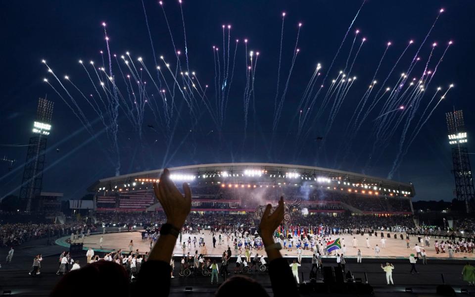 Fireworks explode during the Commonwealth Games opening ceremony at the Alexander stadium - AP