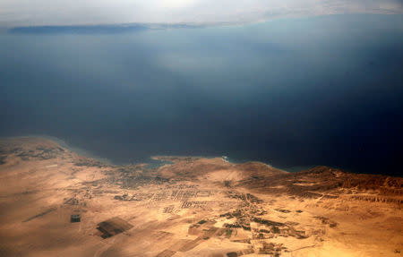 An aerial view of the coast of the Red Sea and the two islands of Tiran and Sanafir is pictured through the window of an airplane near Sharm el-Sheikh, Egypt November 1, 2016. REUTERS/Amr Abdallah Dalsh