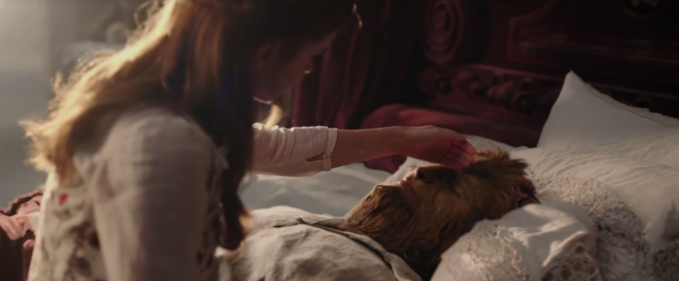 Belle nurses the Beast back to health (Disney)