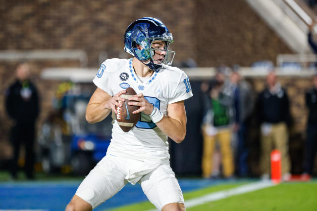 UNC football uniforms through the years.