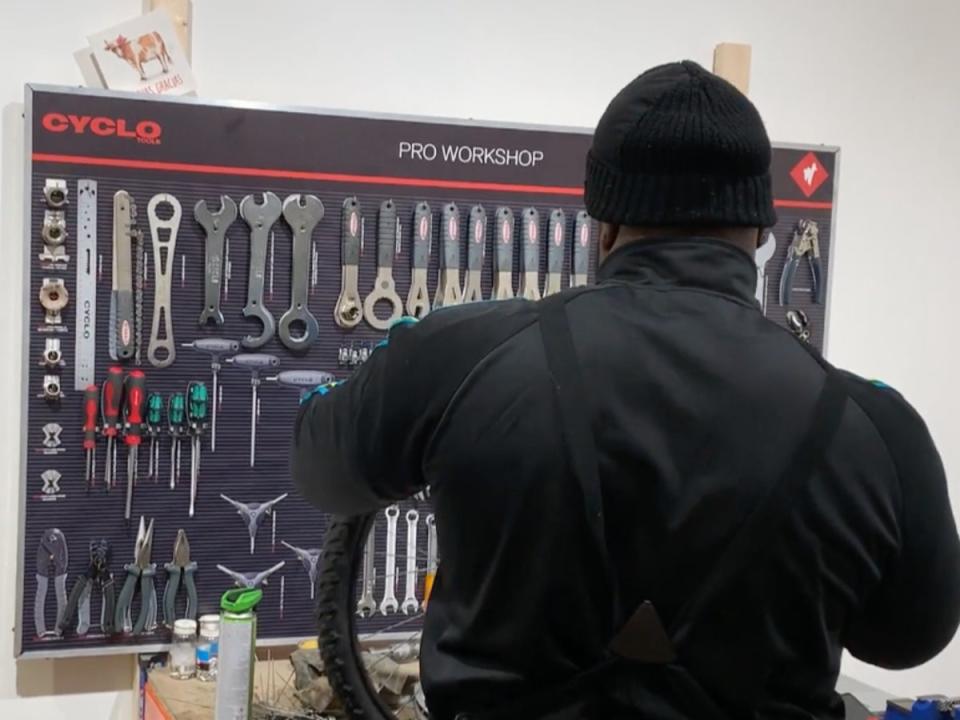 Ed working on a wheel for XO Bikes – each ‘fixer’ inscribes their own tag on each bike they work on (Josh Bullock / Vimeo)