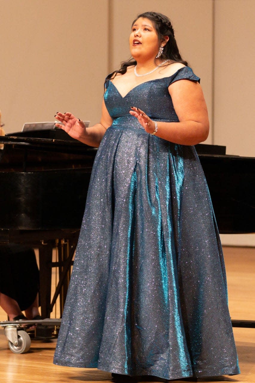 Priscilla Gandara, a music education major at New Mexico State University, performing on stage at the Atkinson Recital Hall for her senior recital April 9, 2022.