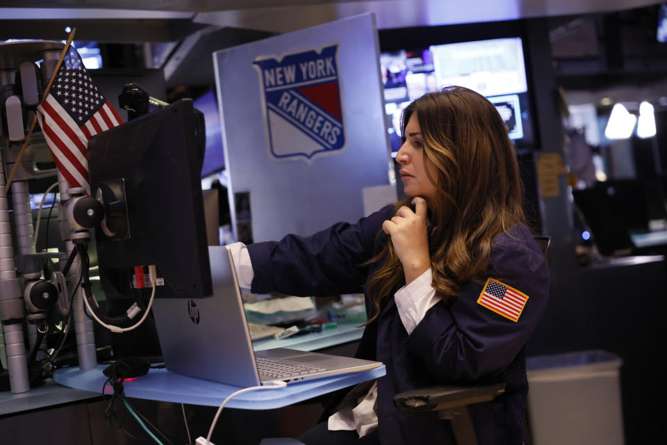 Traders work on the floor of the New York Stock Exchange 