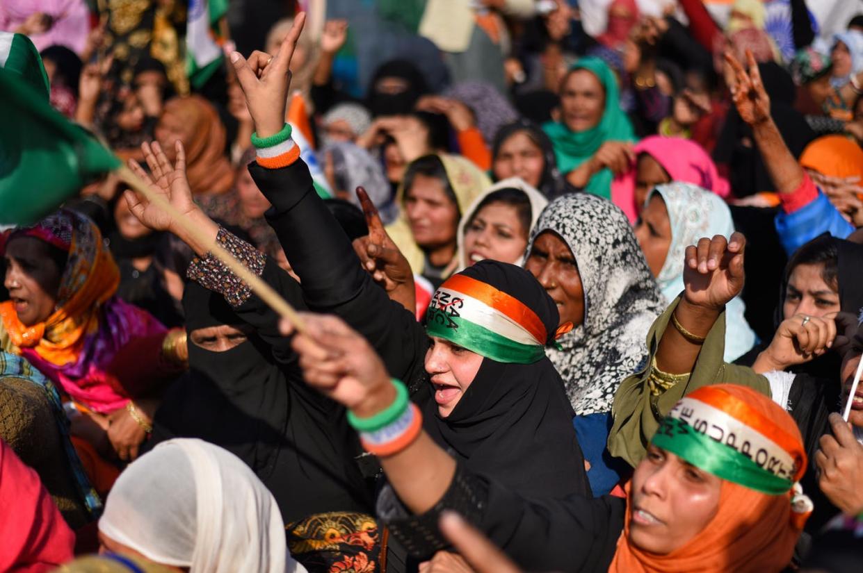 <span class="caption">Women in Delhi's Shaheen Bagh neighborhood are protesting a new Indian citizenship law that they say will discriminate against Muslims, women – and, particularly, Muslim women.</span> <span class="attribution"><a class="link " href="https://www.gettyimages.com/detail/news-photo/women-protesters-raise-slogans-ahead-of-their-march-to-home-news-photo/1201747107?adppopup=true" rel="nofollow noopener" target="_blank" data-ylk="slk:Burhaan Kinu/Hindustan Times via Getty Images;elm:context_link;itc:0;sec:content-canvas">Burhaan Kinu/Hindustan Times via Getty Images</a></span>