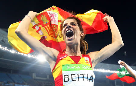 2016 Rio Olympics - Athletics - Final - Women's High Jump Final - Olympic Stadium - Rio de Janeiro, Brazil - 20/08/2016. Ruth Beitia (ESP) of Spain celebrates winning gold. REUTERS/Dominic Ebenbichler