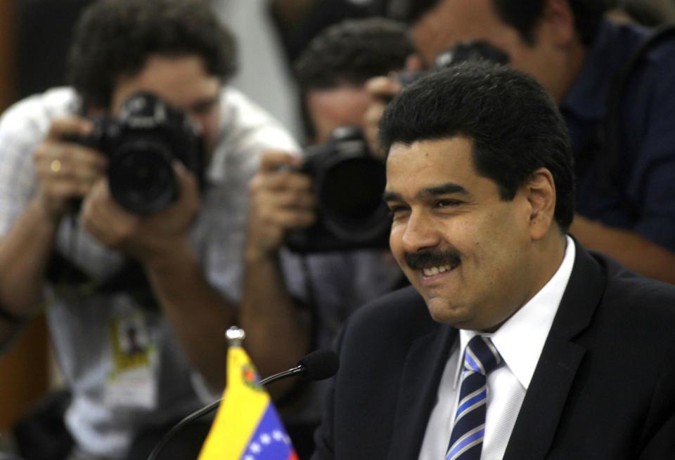 FILE - In this July 30, 2012 file photo Venezuela's Foreign Minister Nicolas Maduro smiles during a meeting ahead a Southern Common Market (MERCOSUR) Summit in Brasilia, Brazil. Venezuela's President Hugo Chavez on Wednesday, Oct. 10, 2012, named Nicolas Maduro as his new vice president. Maduro, a former National Assembly member, has headed the foreign ministry since 2006, and is seen as one of the administration's hard-liners. (AP Photo/Eraldo Peres, file)