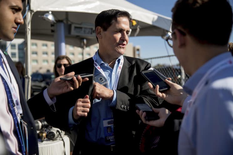 Mark Cuban stops to speak with members of the media as he arrives for the third presidential debate. (Photo: Andrew Harnik/AP)