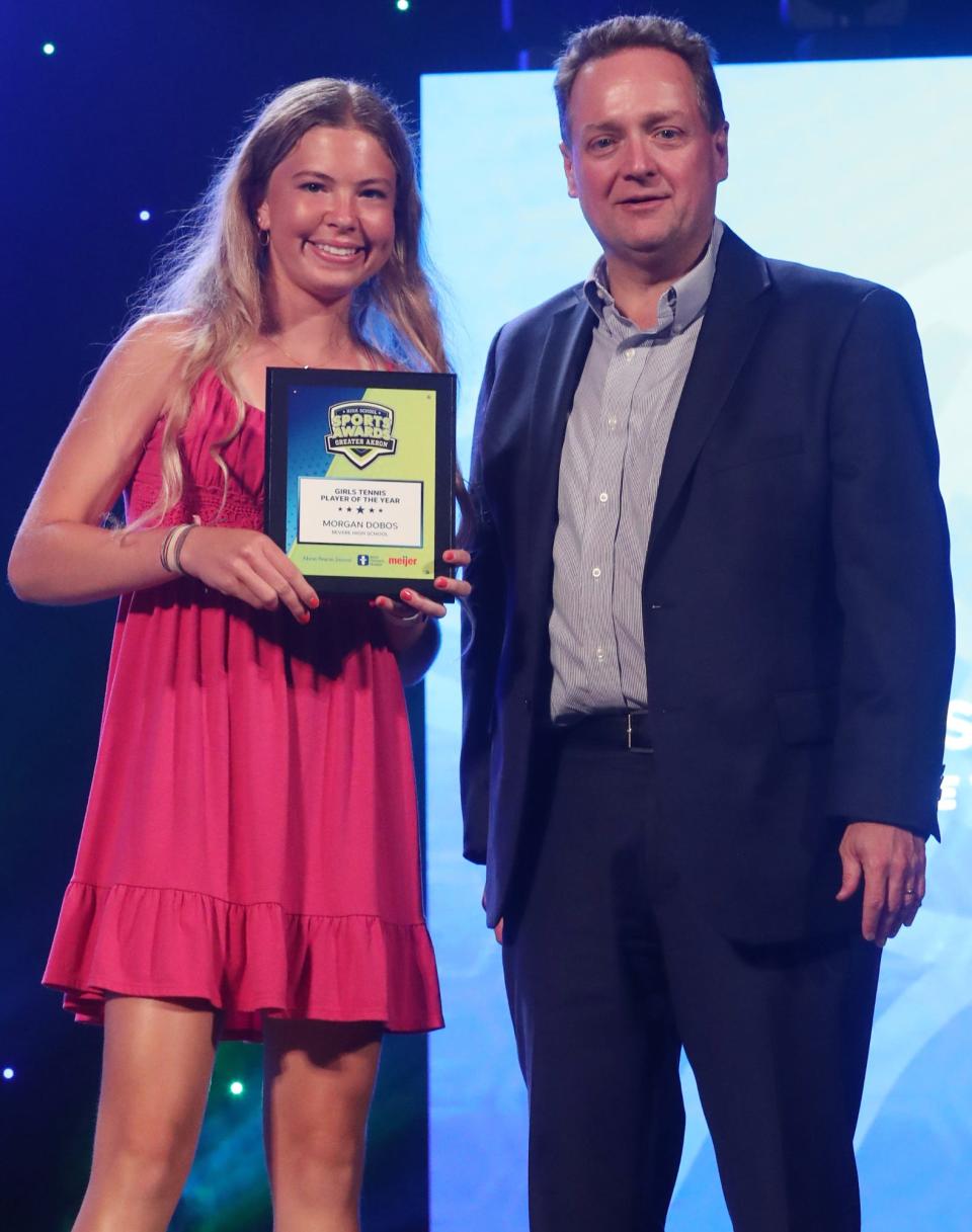 Revere High's Morgan Dobos Greater Akron Girls Tennis Player of the Year with Michael Shearer Akron Beacon Journal editor at the High School Sports All-Star Awards at the Civic Theatre in Akron on Friday.