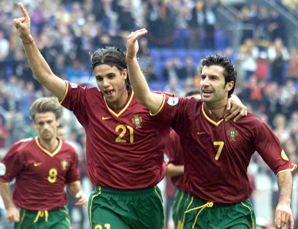 Portuguese players Luis Figo (r) and Nuno Gomes (l) celebrate after Gomes scored in the quarter-final match against Turkey in 2000.