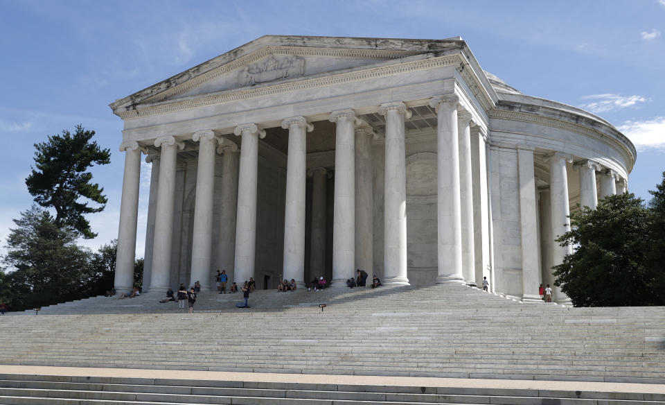 FILE - A grimy biofilm is seen along the upper edges and corners of the Thomas Jefferson Memorial in Washington, Wednesday, Aug. 10, 2016. Work has begun on giving some of America’s most spectacular natural settings and historic icons a makeover. The Great American Outdoor Act was passed by Congress last year and dedicated up to $1.6 billion a year for the next five years to extensive maintenance and repairs that have been put off year after year. (AP Photo/Carolyn Kaster, File)