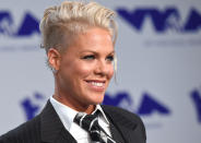 <p>The Michael Jackson Video Vanguard Award recipient’s inner and outer glow was the talk of the night at the MTV VMAs. Here, she poses on the red carpet sporting her signature undercut hairdo, black eyeliner, and nude lip gloss. (Photo by Anthony Harvey/Getty Images) </p>