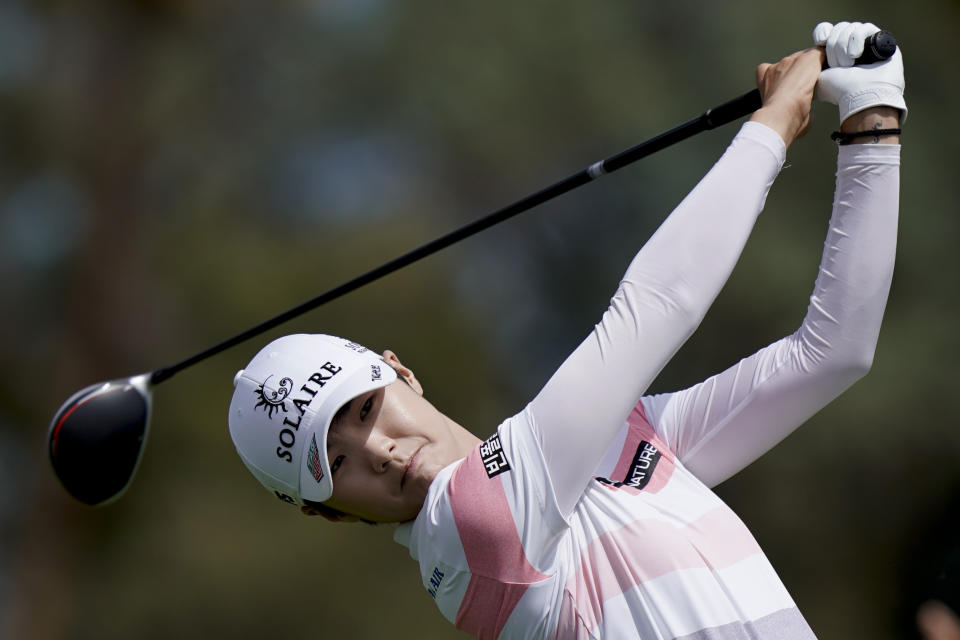 Sung Hyun Park, of South Korea, watches her tee shot on the third hole during the third round of the LPGA Tour ANA Inspiration golf tournament at Mission Hills Country Club, Saturday, April 6, 2019, in Rancho Mirage, Calif. (AP Photo/Chris Carlson)