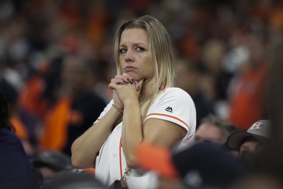 A fan watches during the ninth inning of Game 6 of the baseball World Series between the Houston Astros and the Washington Nationals Tuesday, Oct. 29, 2019, in Houston. (AP Photo/David J. Phillip)