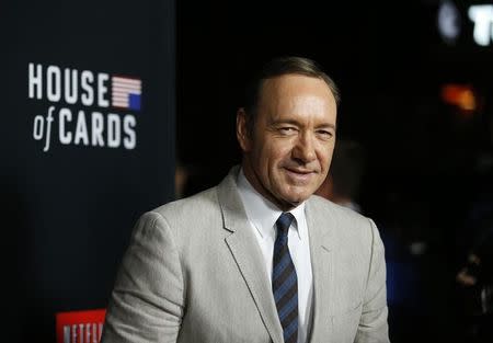 Cast member Kevin Spacey poses at the premiere for the second season of the television series "House of Cards" at the Directors Guild of America in Los Angeles, California February 13, 2014. REUTERS/Mario Anzuoni