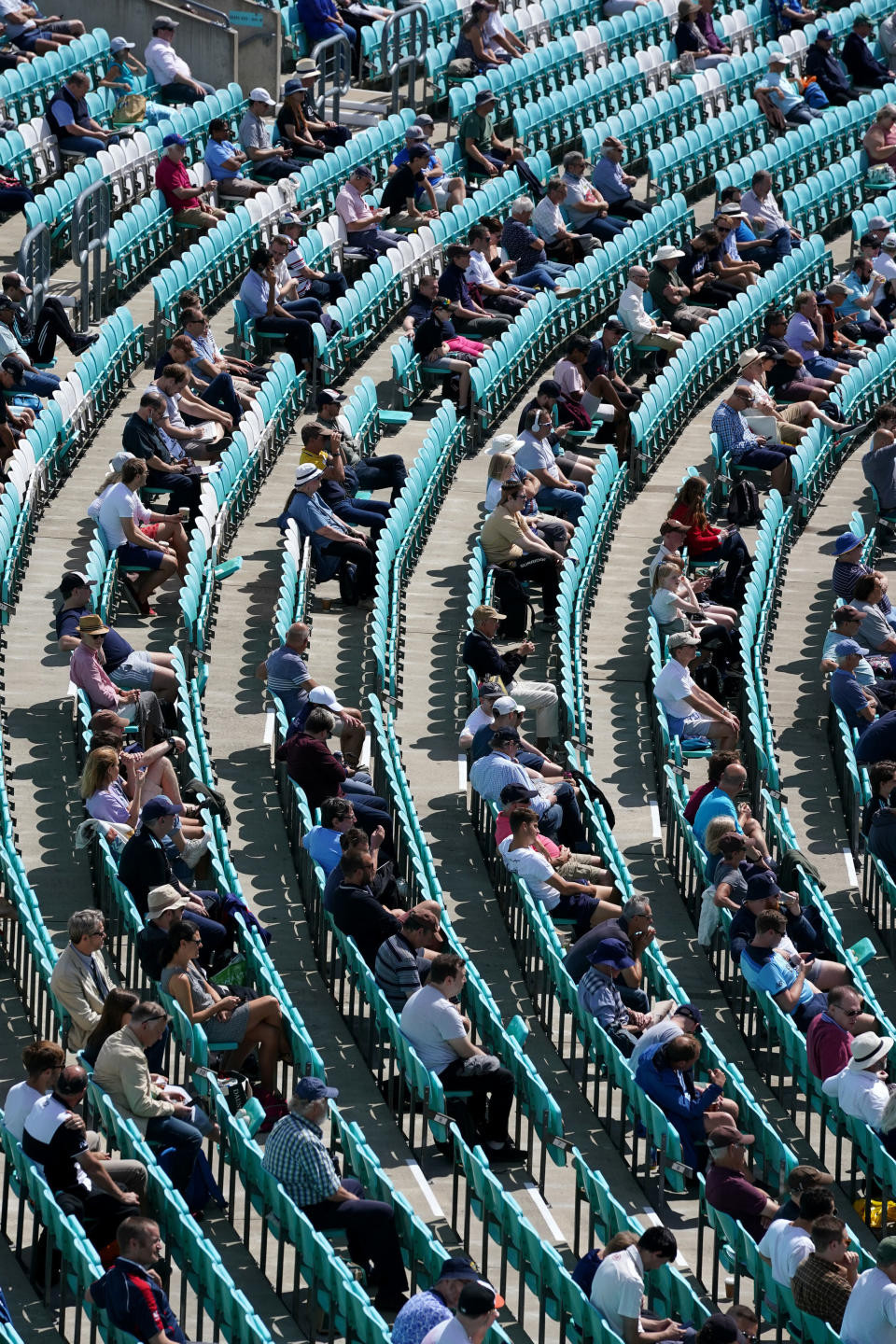 Seats were left empty to keep distance between spectators. (PA)