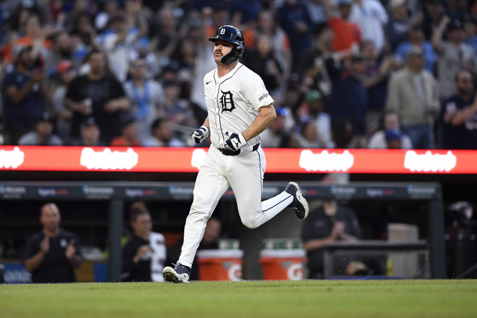 Detroit Tigers' Jake Rogers scores against the Kansas City Royals during the seventh inning of a baseball game Saturday, April 27, 2024, in Detroit. (AP Photo/Jose Juarez)