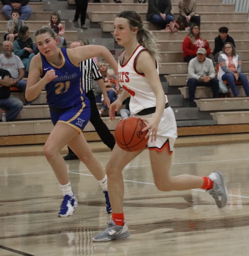 Meadowbrook's Karly Launder (3) heads up court past West Muskingum's Zoie Settles (21) during a regular season game. She was a District 12 First Teamer for the Colts.