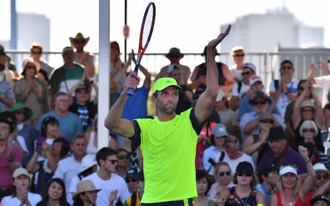 Croatia's Ivo Karlovic reacts after beating Japan's Yuichi Sugita in their men's singles second round match on day three of the Australian Open tennis tournament in Melbourne on January 17, 2018 - Credit: AFP