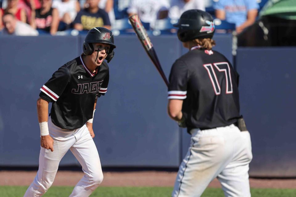 Owen Parrish (5) celebrates after scoring for Appoquinimink during the DIAA Baseball Tournament semifinal game between Appoquinimink and Conrad Saturday at Frawley Stadium.
