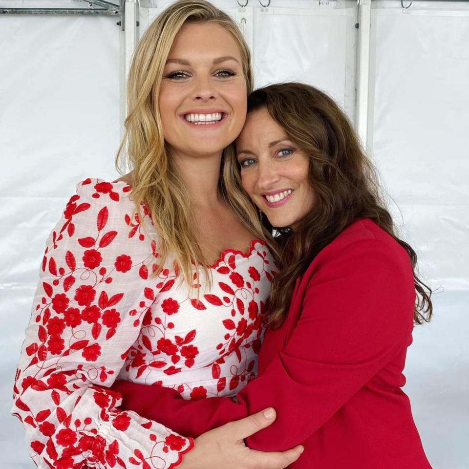 Sophie Dillman is hugged by Georgie Parker onset