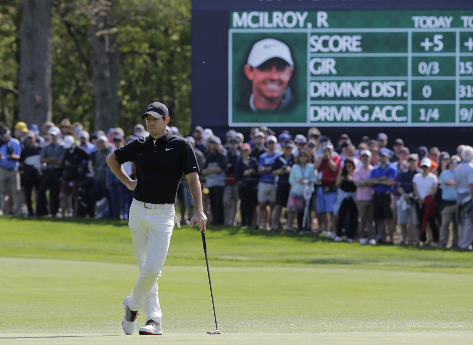 Rory McIlroy, of Northern Ireland, waits to putt on the 13th green during the second round of the PGA Championship golf tournament, Friday, May 17, 2019, at Bethpage Black in Farmingdale, N.Y. (AP Photo/Seth Wenig)