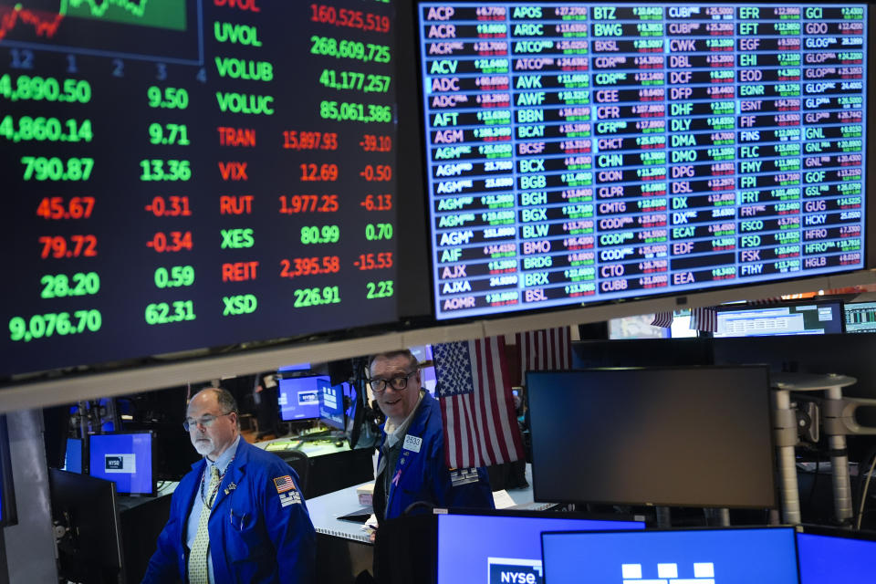 Traders work on the floor at the New York Stock Exchange in New York, Tuesday, Jan. 23, 2024. (AP Photo/Seth Wenig)