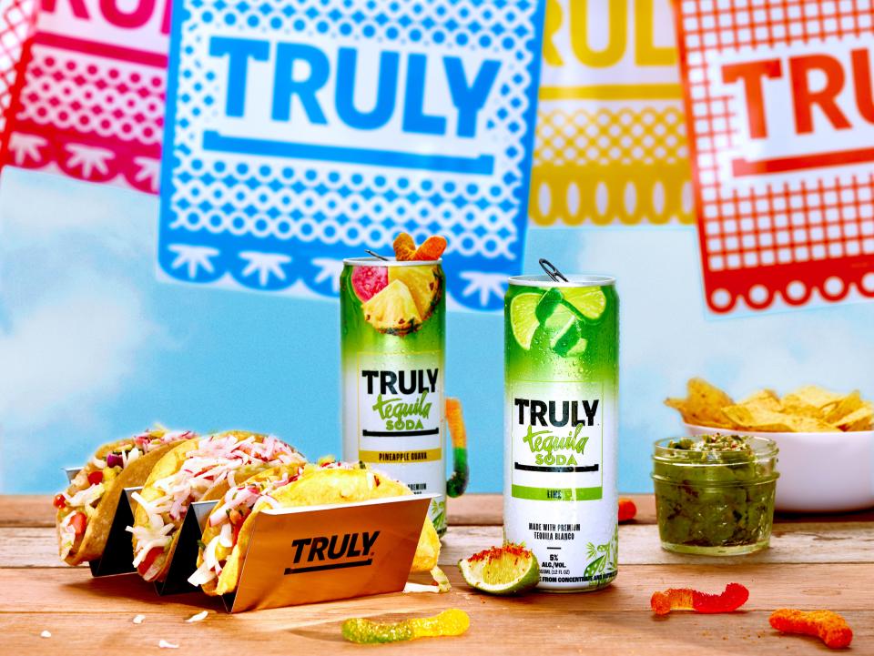 The Truly Tequila Soda Fiesta Pack ($25) includes four cans of Truly Tequila Soda, along with Truly-branded taco holders, pennant flags and chamoy flavored gummy worms to add to your drinks.