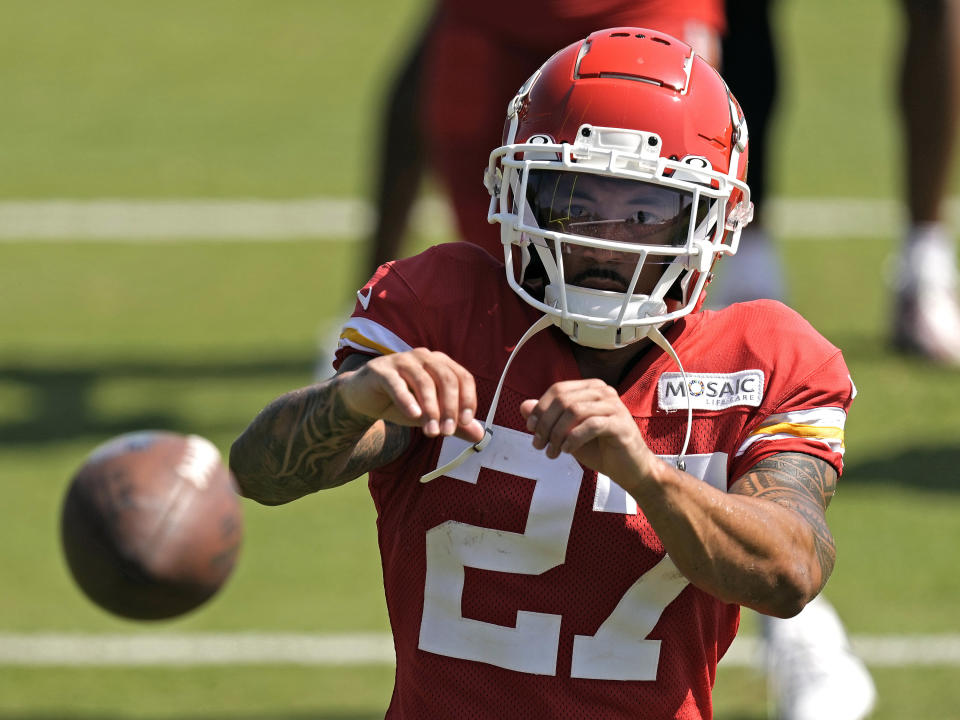 FILE - Kansas City Chiefs wide receiver Nikko Remigio catches a ball after NFL football training camp July 28, 2023, in St. Joseph, Mo. Historically, Asian Americans and have been stereotyped as more brains than brawn or "foreigners" not fit for some American sports. Many current and former athletes of Asian American as well as Pacific Islander heritage agreed that such misconceptions have mostly faded. Increasingly, major athletes have been able to amplify their culture on a public stage and be embraced by the public. (AP Photo/Charlie Riede, File)