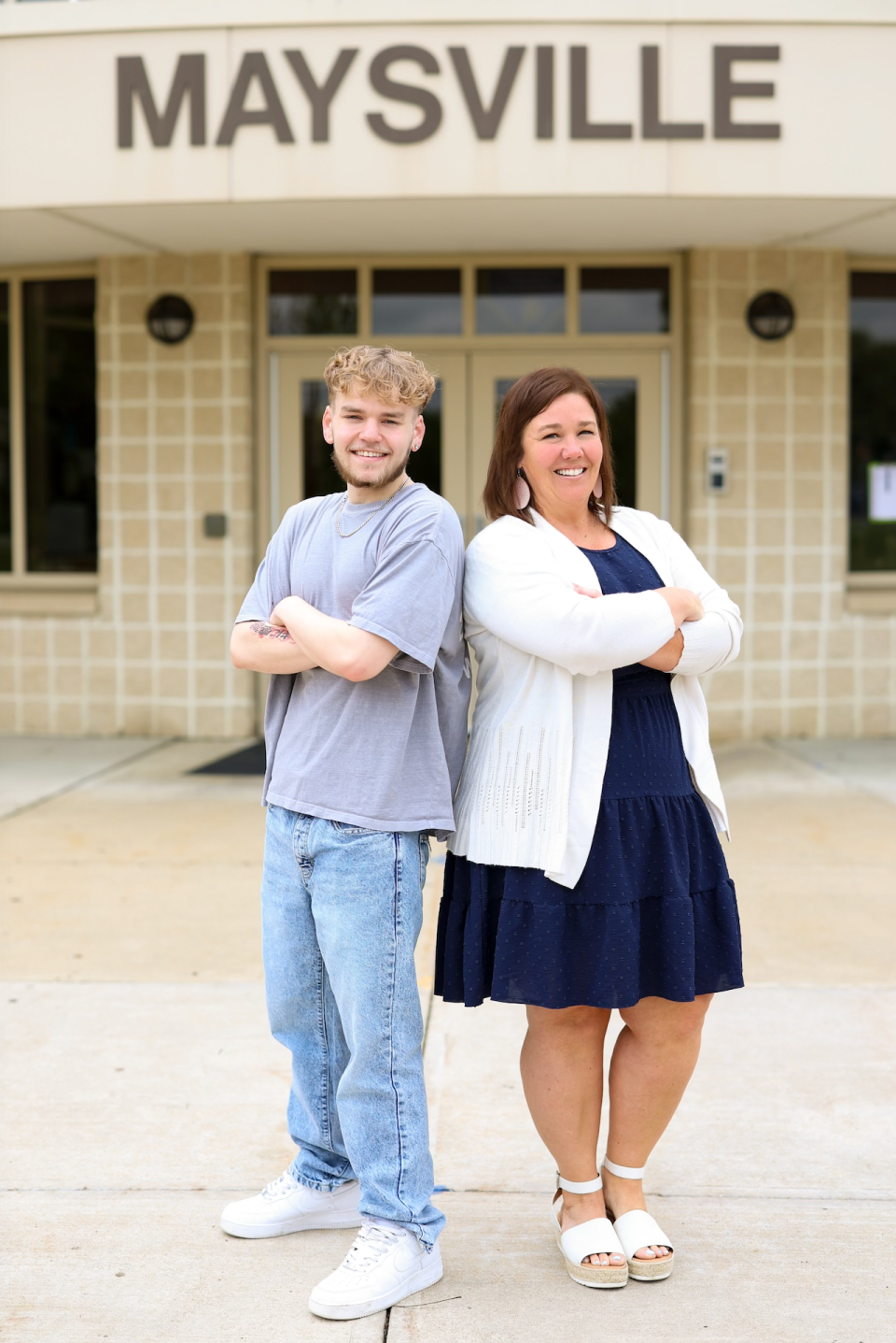 Senior Ty Taylor will graduate from Maysville High School on Friday, after overcoming tremendous odds. Guidance Counselor Rebecca McConnel, right, said Taylor's humbleness and drive to succeed is what helped him overcome difficulties in his life.