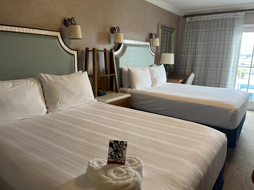 club-level suite with two queen beds at disney's beach club resort in disney world