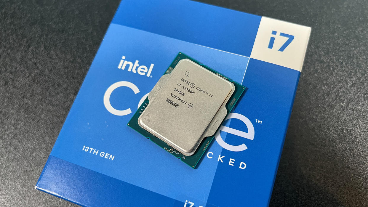  An Intel Core i7-13700K against its retail packaging 