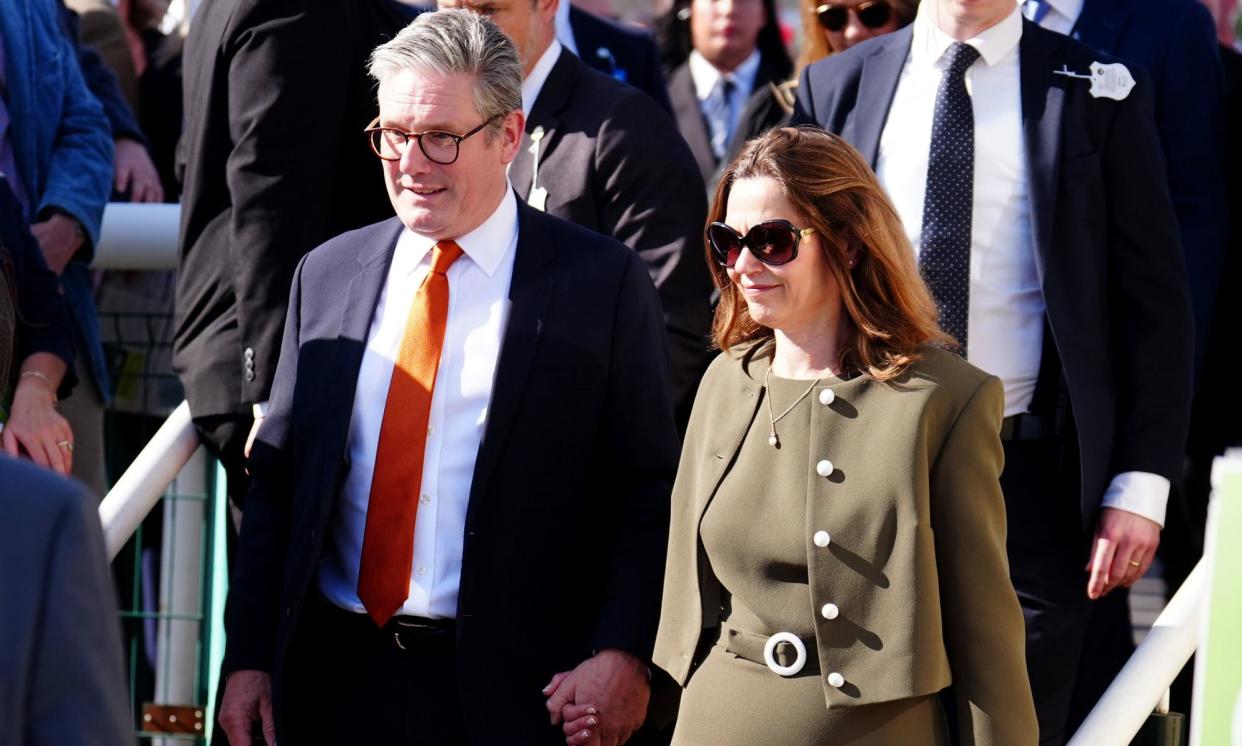 <span>Keir Starmer with his wife, Victoria, at the St Leger festival at Doncaster racecourse on Saturday.</span><span>Photograph: Mike Egerton/PA</span>