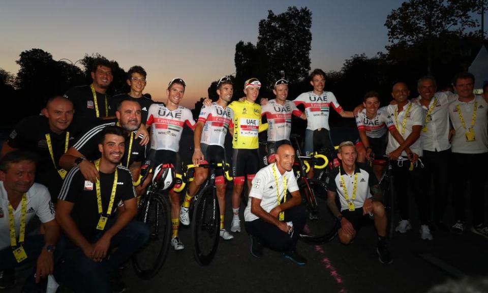 Mauro Gianetti (kneeling centre-left) is the team principal of UAE Team Emirates.