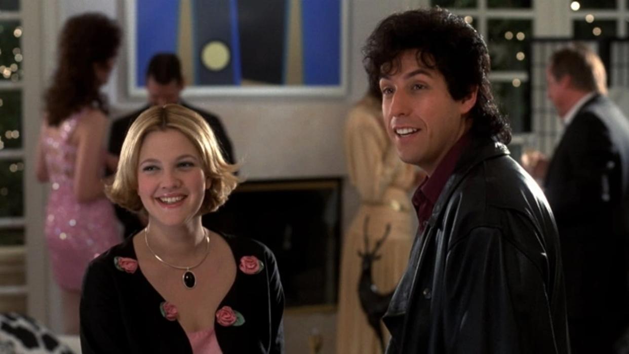  Drew Barrymore and Adam Sandler in The Wedding Singer . 