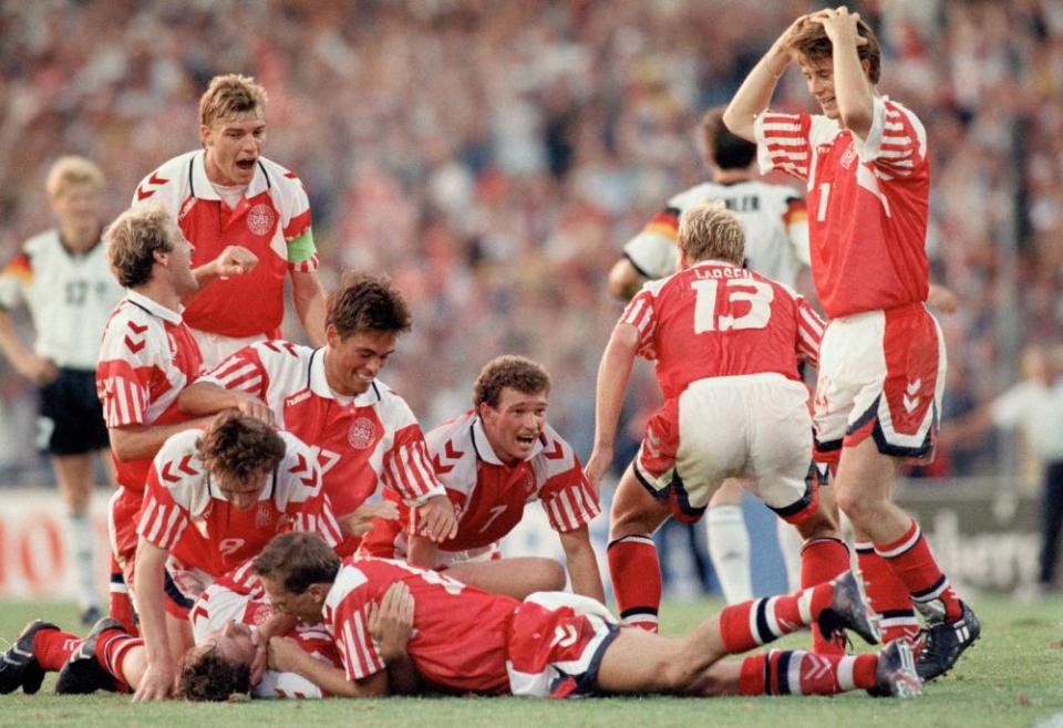 Kim Vilfort is mobbed by team-mates after scoring the second and winning goal in the 1992 final between Denmark and Germany