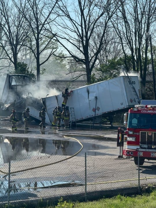 Firefighters extinguish a blaze inside a semi-truck trailer that contained nearly three tons of lithium-ion batteries, which created a hazmat situation, April 18, 2024. (Courtesy/Columbus Division of Fire)