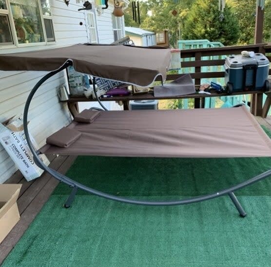 brown outdoor patio daybed on reviewer's deck