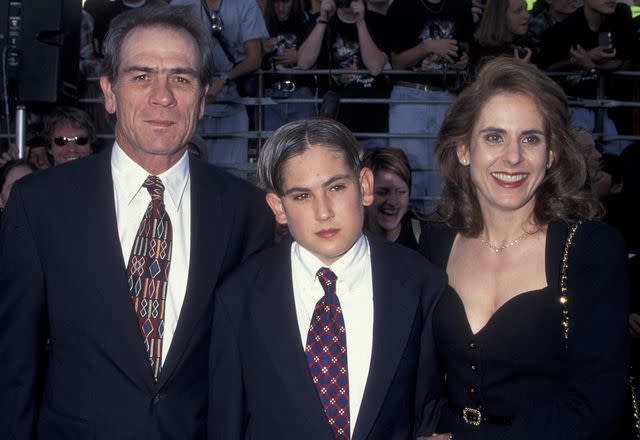 <p>Ron Galella, Ltd./Ron Galella Collection/Getty</p> Tommy Lee Jones, Kimberlea Jones, and their son Austin Jones attend the world premiere of "Batman Forever" on June 9, 1995 in Westwood, California.