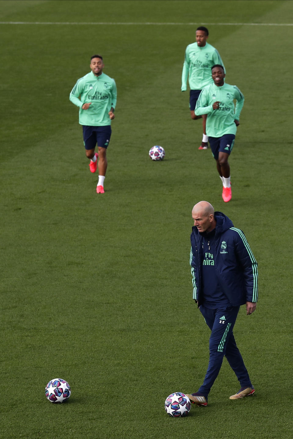 Real Madrid's head coach Zinedine Zidane attends a training session at the team's Valdebebas training ground in Madrid, Spain, Tuesday, Feb. 25, 2020. Real Madrid will play against Manchester City in a Champions League soccer match on Wednesday. (AP Photo/Manu Fernandez)