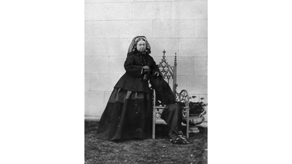 Queen Victoria of Great Britain (1819 - 1901) at Balmoral Castle, Scotland, with her dog 'sharp'