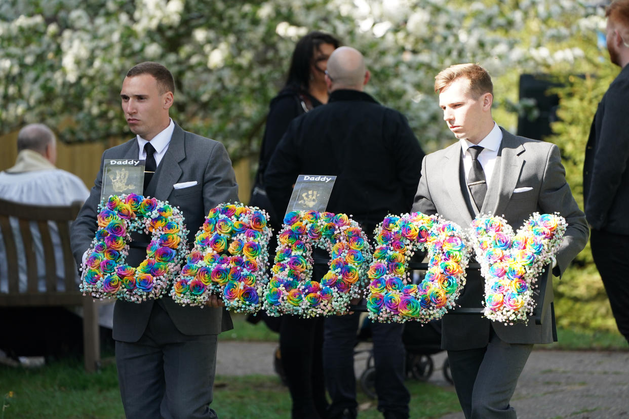 A floral tribute is carried into St Francis of Assisi church ahead of the funeral of The Wanted star Tom Parker in Queensway, Petts Wood, in south-east London, following his death at the age of 33 last month, 17 months after being diagnosed with an inoperable brain tumour. Picture date: Wednesday April 20, 2022. (Photo by Kirsty O'Connor/PA Images via Getty Images)