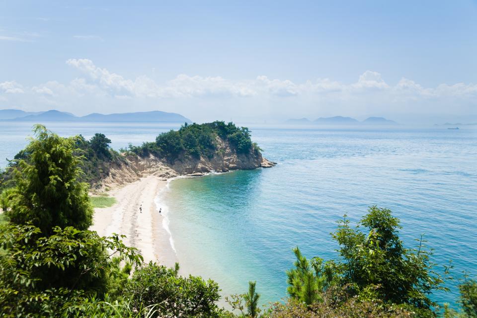 <h1 class="title">Beach and calm blue water, Seto Inland Sea, Japan</h1><cite class="credit">Photo: Getty Images</cite>