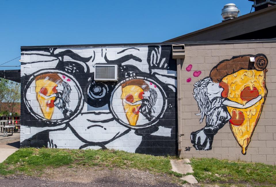 Murals adorned the sides of Two P’s Pizza & Pub in Pekin.