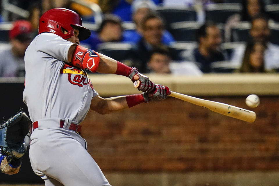 St. Louis Cardinals' Tommy Edman hits an RBI triple during the fifth inning in the second baseball game of a doubleheader against the New York Mets Tuesday, May 17, 2022, in New York. (AP Photo/Frank Franklin II)