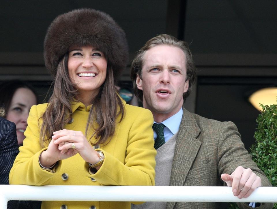 Pippa Middleton and Thomas Kingston watch the Cheltenham Festival races on March 14, 2013. Getty Images