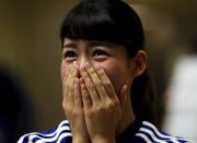 A soccer fan of Japan reacts during their FIFA Women's World Cup semi-final soccer match against England, at a public viewing event in Tokyo, Japan, July 2, 2015. REUTERS/Yuya Shino