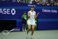 Iga Swiatek, of Poland, reacts after defeating Aryna Sabalenka, of Belarus, during the semifinals of the U.S. Open tennis championships, Thursday, Sept. 8, 2022, in New York. (AP Photo/Charles Krupa)