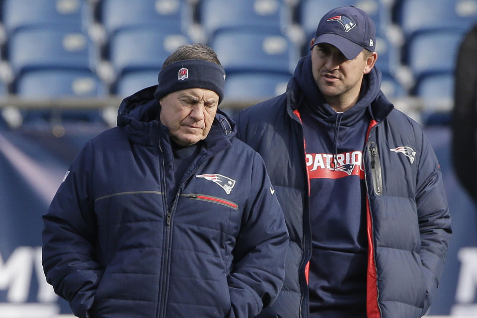 FILE - In this Dec. 20, 2018, file photo, New England Patriots head coach Bill Belichick, left, speaks with special teams coach Joe Judge, right, during NFL football practice in Foxborough, Mass. The New York Giants and Patriots assistant Joe Judge are working on a deal for him to become the team's head coach, a person familiar with the negotiations told The Associated Press The person spoke to the on condition of anonymity Tuesday, Jan. 7, 2020, because the deal is not done. (AP Photo/Steven Senne)