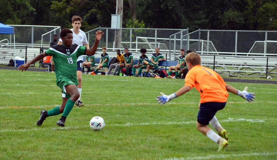 South Hagerstown's Seth Seaward works the ball past Catoctin goalie Chase Jackson for his second goal of the game during the Stan Stouffer Showcase at Williamsport on Sept. 10, 2022.